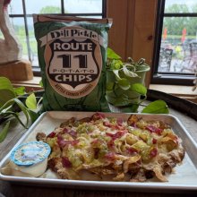 Irish pickle nachos with Route 11 potato chips bag propped up behind